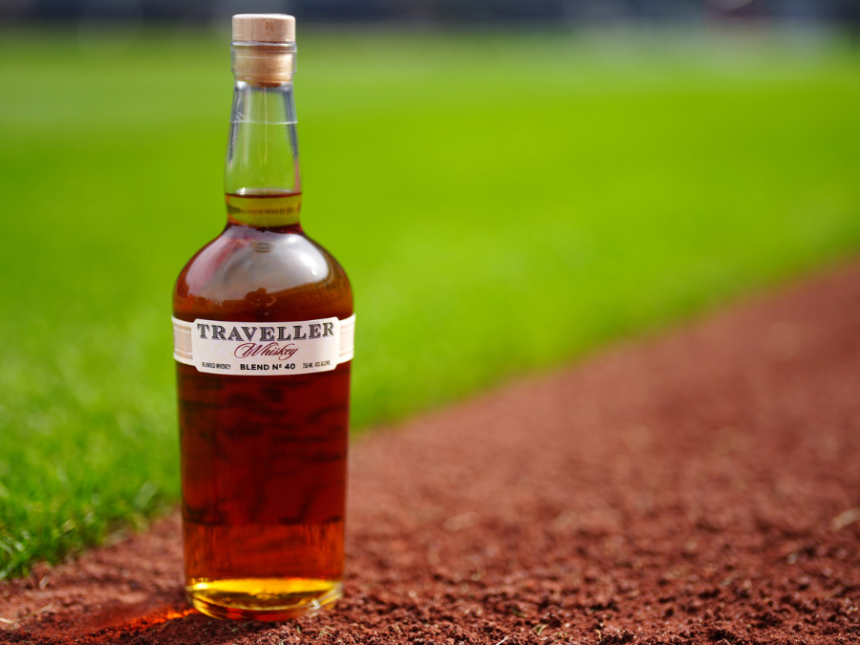 Traveller Whiskey bottle on baseball pitch