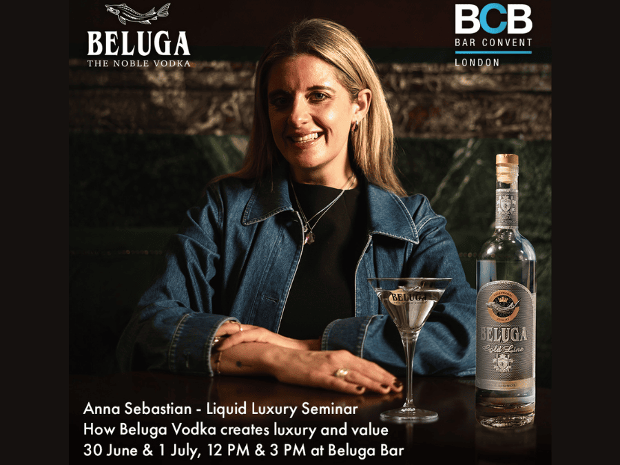 Anna Sebastian with Beluga vodka bottle