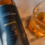 Binder's Stash bottle and glass
