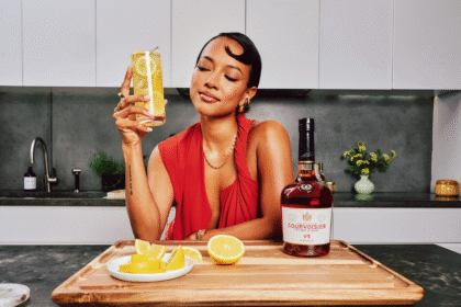 Karrueche Tran with Courvoisier bottle and serve
