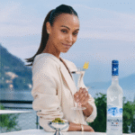Zoe Saldaña with Grey Goose bottle and serve