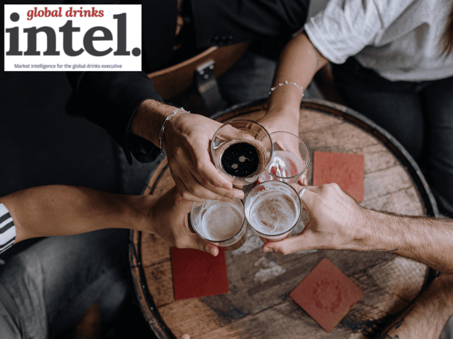 Four drinks on a pub table from above