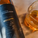 Binder's Stash bottle and glass