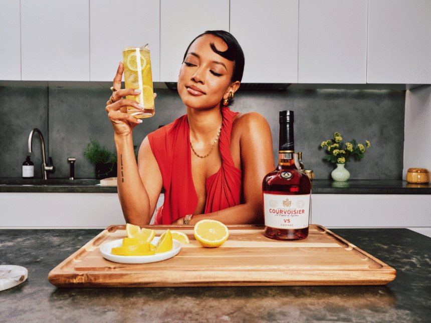 Karrueche Tran with Courvoisier bottle and serve