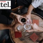 Four drinks on a pub table from above