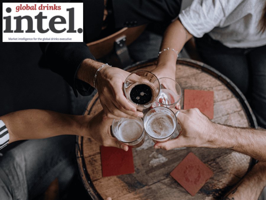 Four drinks on a pub table from above