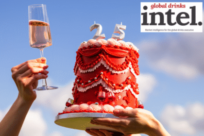 Virgin Wines cake with 25 and a raised glass of wine