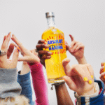 Absolut Haring bottle held in the air