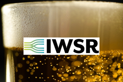 Vlose-up of a head on a beer with IWSR logo