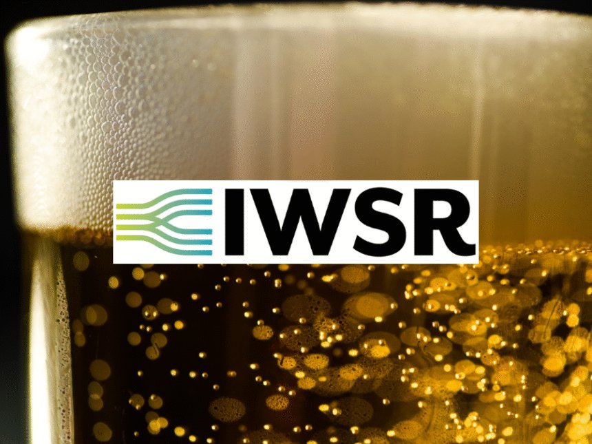 Vlose-up of a head on a beer with IWSR logo