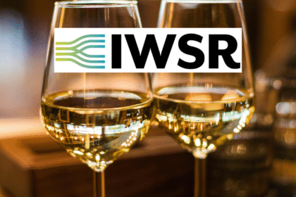 Two wine glasses behind IWSR logo