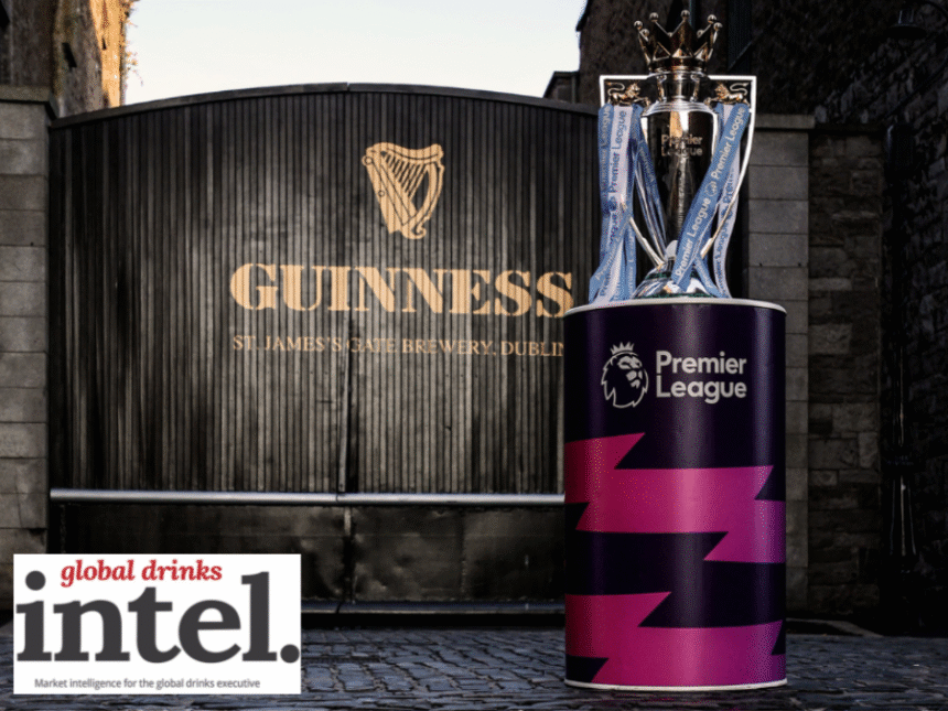 The English Premier League trophy in front of a Guinness-branded gate