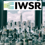 Spirits bottles against a New York skyline with IWSR logo
