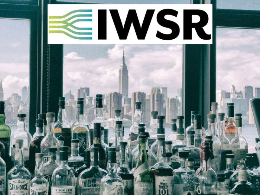 Spirits bottles against a New York skyline with IWSR logo
