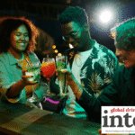 Three younger LDA drinkers in a bar