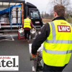Staff wearing LWC-branded hi-vis tabards