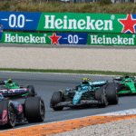 F1 cars with Heineken logo on banner