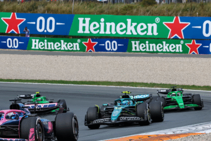 F1 cars with Heineken logo on banner