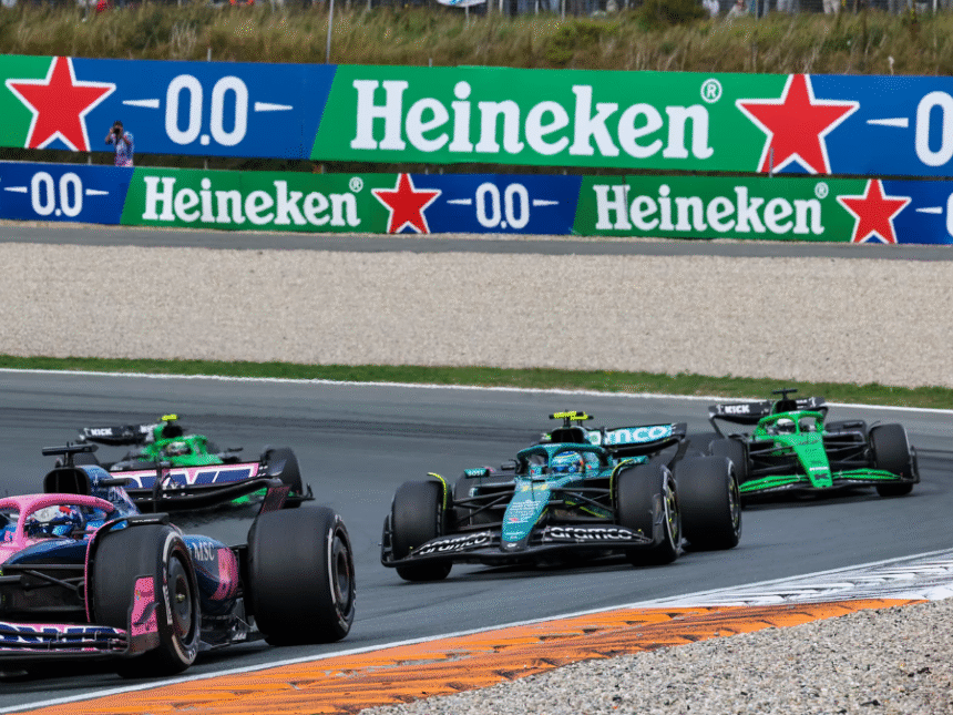 F1 cars with Heineken logo on banner