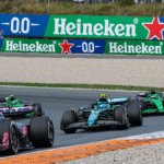 F1 cars with Heineken logo on banner