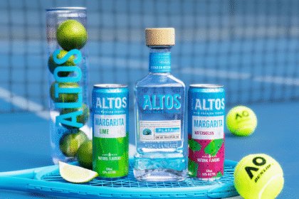 Altos product with tennis racquet on a tennis court