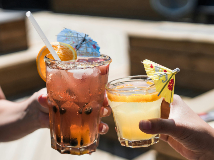 Two alcoholic drinks in glasses