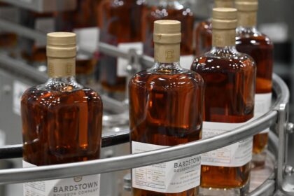 Bottles of Bourbon on a bottling line