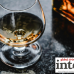 Glass containing aged spirit