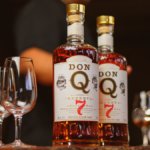 Don Q 7-year-old rum bottles on a bar