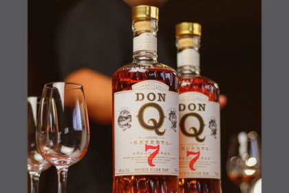 Don Q 7-year-old rum bottles on a bar