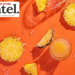 Slices of pineapple next to pineapple drinks