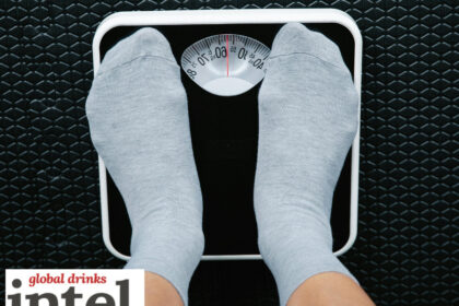 Looking down at feet on bathroom scales