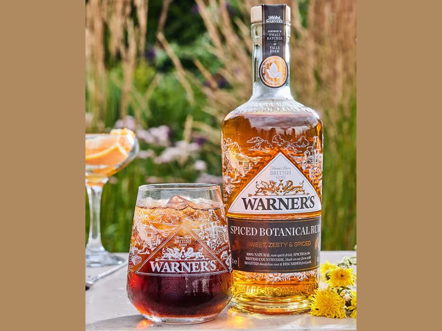Warner’s Spiced Botanical Rum bottle plus serve