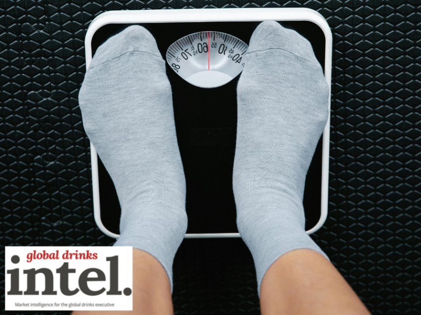 Looking down at feet on bathroom scales