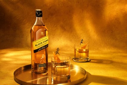 Bottle of Johnnie Walker Black Cask on a tray with a glass