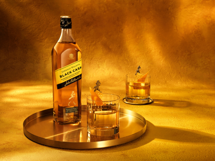 Bottle of Johnnie Walker Black Cask on a tray with a glass