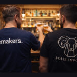 Two men with Bemakers and Jolie-branded shirts