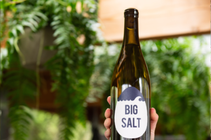 Bottle of Big Salt wine being held up