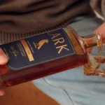 Lark Distilling Co bottle being poured