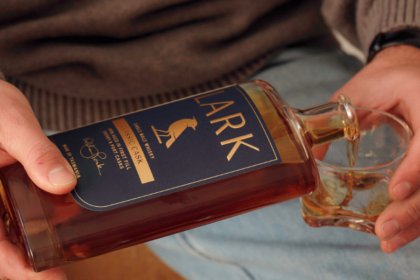 Lark Distilling Co bottle being poured
