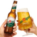 San Miguel bottle and branded glass