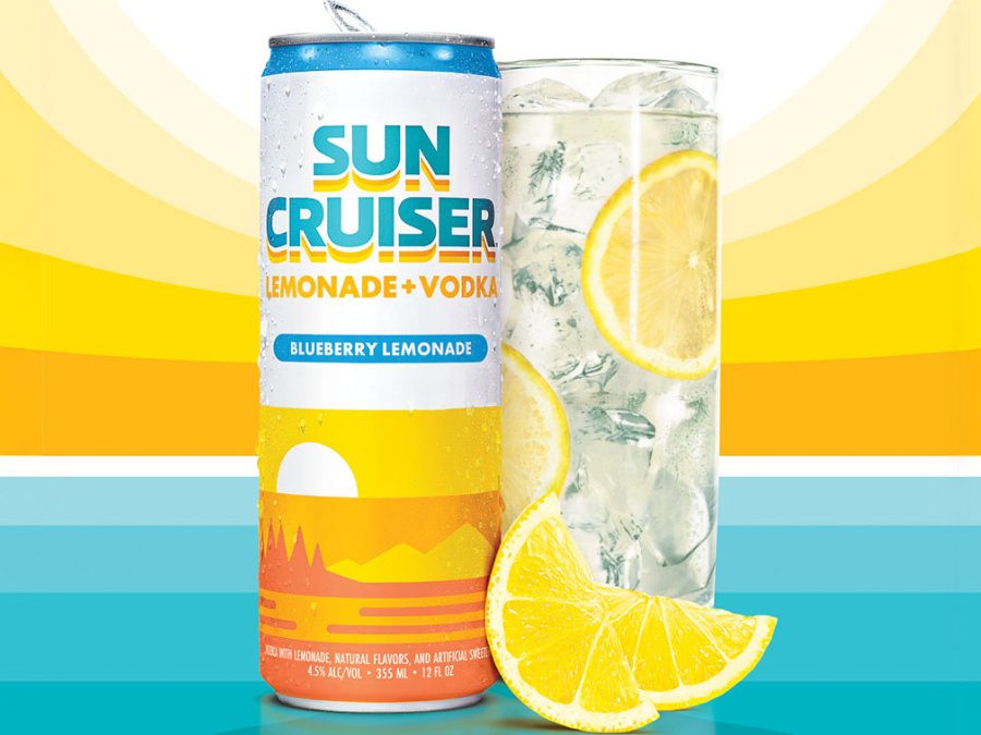 A can of Sun Cruiser next to a glass with sunset graphic in background