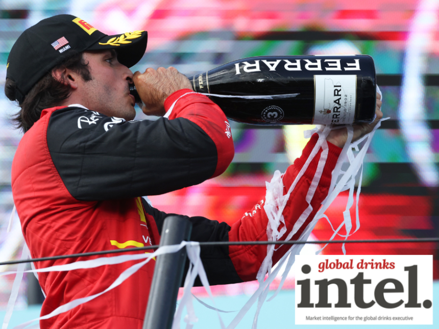 F1 driver Carlos Sainz with a bottle of Ferrari Trento at the Miami Grand Prix in 2022