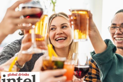 Younger drinkers toasting with glasses
