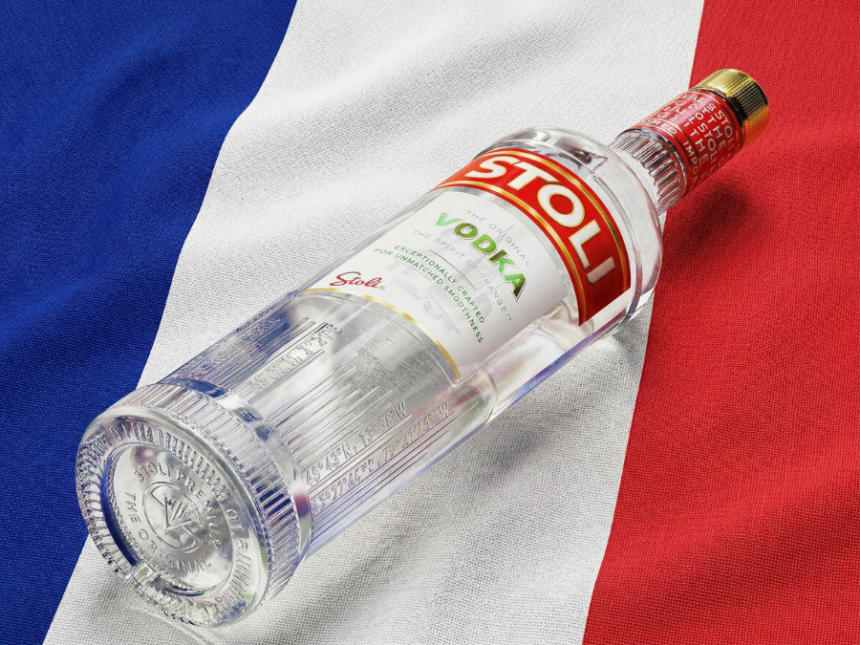 Stoli vodka bottle against French flag