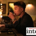 Chinese consumer drinking a spirit serve in a bar
