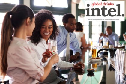 Patrons in a hotel bar enjoying drinks