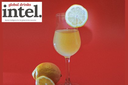 Glass of limoncello with lemon garnish