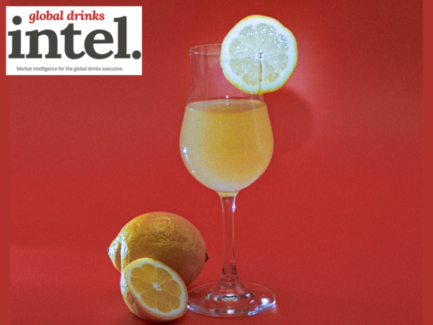 Glass of limoncello with lemon garnish