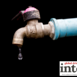 Water tap with black background